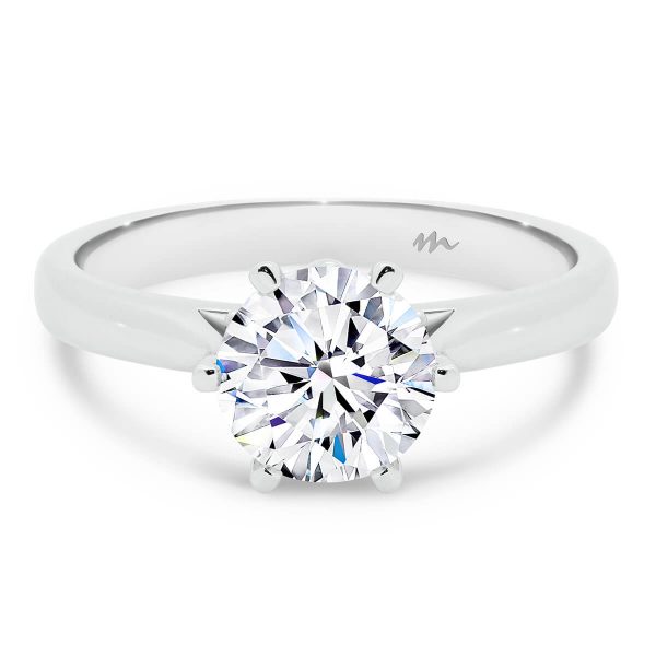 Round Solitaire Design With Floral Setting On Plain Tapered Band