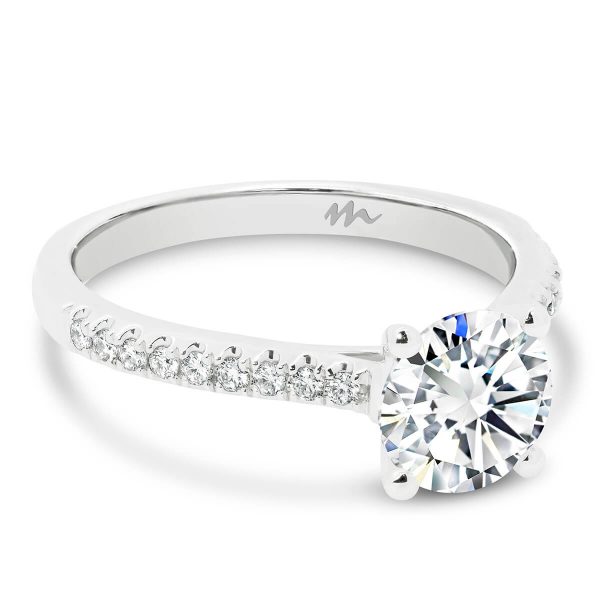 Lyla 6.5-7.0 timeless 4-prong round Moissanite ring on delicate band prong set