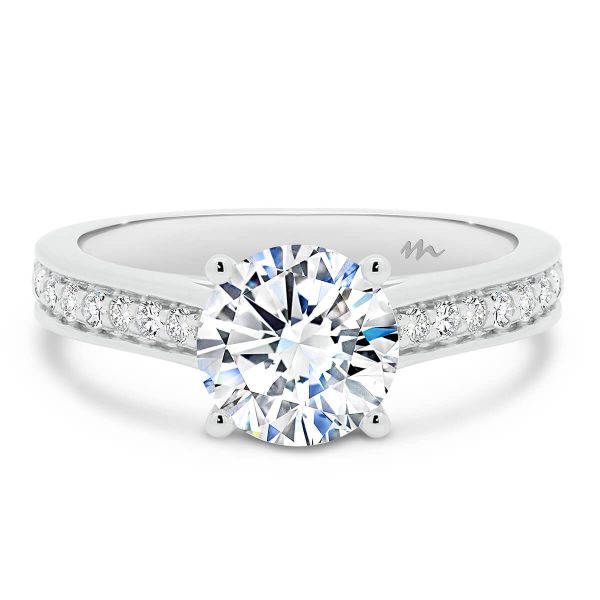 Neema 7.5-8.0 Moissanite engagement ring with pave accented band.