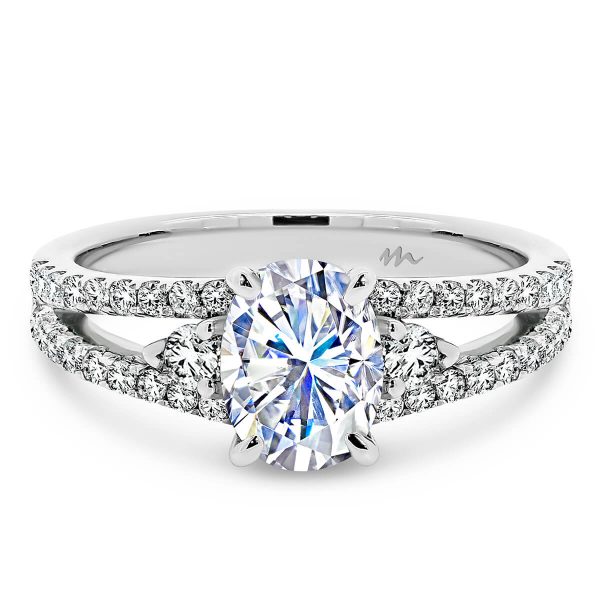 Sydney Oval 8x6-9x7 Oval Moissanite ring with a split band of encrusted jewels.