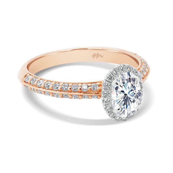 Arianne Oval delicate halo ring on pave-set knife-edge band in two tone gold