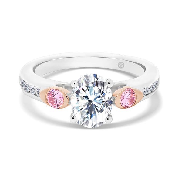 Melbourne Oval Pink 4 prong ring with pink side stones in rose gold bezel set and channel set band