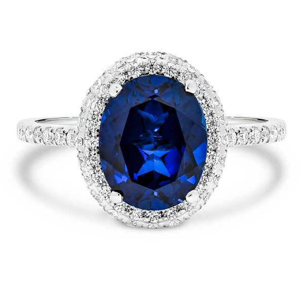 Vivienne oval sapphire halo ring with rolling-edge halo and accented  bridge and band