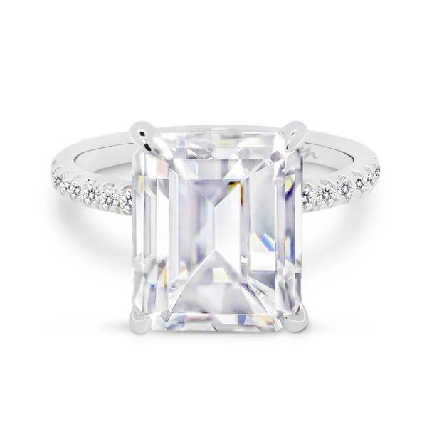 Estella large emerald cut on delicate prong set half band with micro-pave under-rail