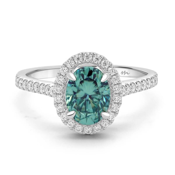 Ava Oval Green Moissanite halo ring on 3/4 set band