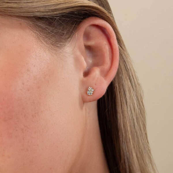 Model Wears Lab Grown Diamond Ginger Round Cluster Studs Yellow Gold Cropped