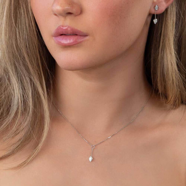 Model Wears Lab Grown Diamond Jen Pear Bezel Drop Pendant And Earring Enhancer With Athena Pear Studs White Gold Cropped