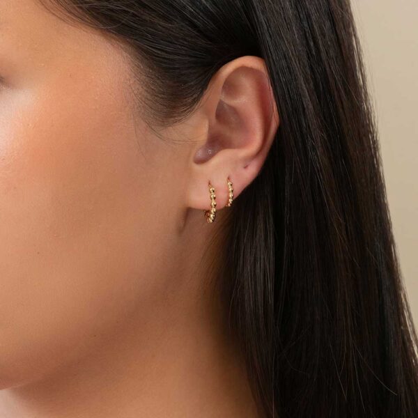 Model Wears Stacked Hope Small Medium Ball Plain Hoop Earrings Yellow Gold Cropped