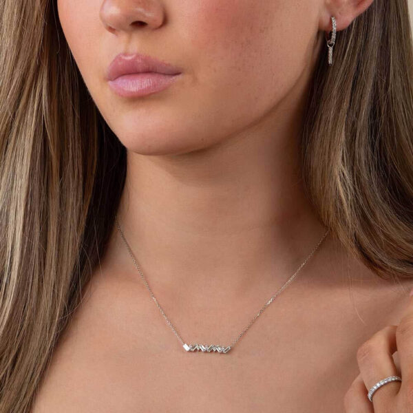 Model Wears White Gold Addison Baguette Bar Necklace Erica 1.5 Large Hoops Gemma Small Pointed Bar Diamond Earring Cropped