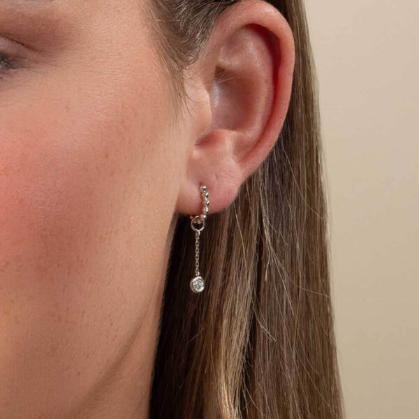 Model Wears White Gold Jen Round Small Drop Earring Enhancer Diamond With Hope Small Ball Plain Hoops Cropped