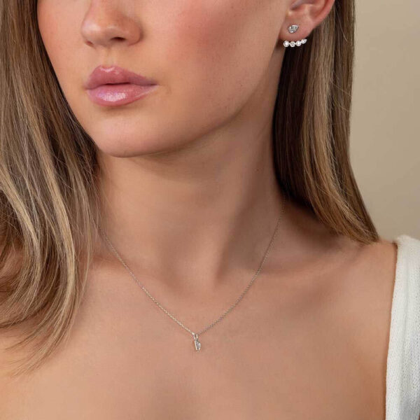 Model Wears White Gold Lou Half Moon Pendant Athena Pear Bezel Studs Thalia Tapered Diamond Bar Earring Enhancer Cropped