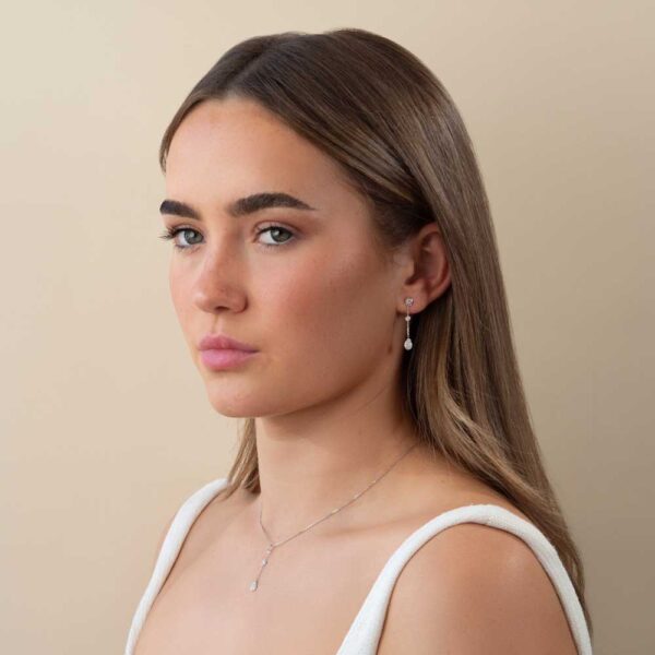 Model Wears White Gold Tate Pear Drop Earring Enhancer And Pendant With Lab Grown Diamond Anna Studs