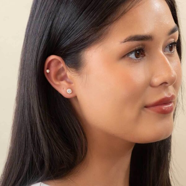 Model Wears Yellow Gold Anna 0.50Ct Round Studs Anna 0.10Ct Bezel Helix Diamond Earrings