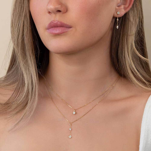 Model Wears Yellow Gold Anna Studs Joanna Round Small Bezel Enhancer Lou Round Large Diamond Charm Cropped