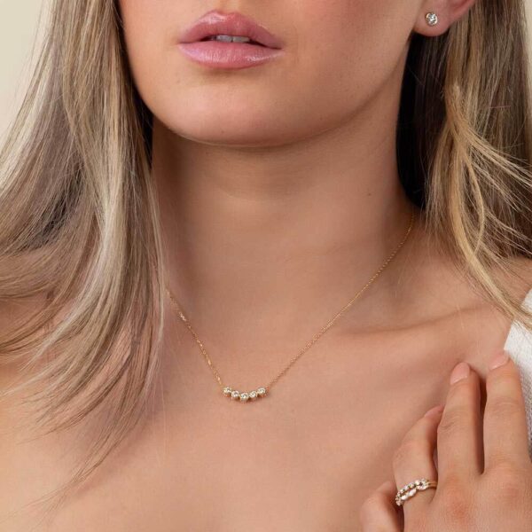 Model Wears Yellow Gold August 5 Diamond Round Bezel Slider Pendant With Anna Stud Earrings Cropped